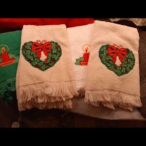 Four Christmas holiday hand towels vintage heart wreaths and candles cannon